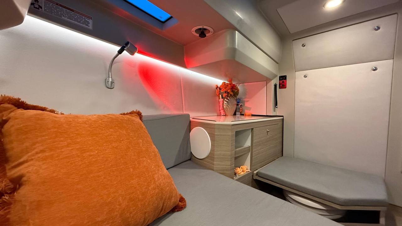 Luxurious Cabin Interior with Red Ambient Lighting